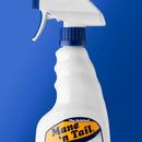 Mane 'n Tail detangler spray bottle on a blue background