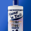 Mane 'n Tail Ultimate Gloss Shampoo bottle on a blue background
